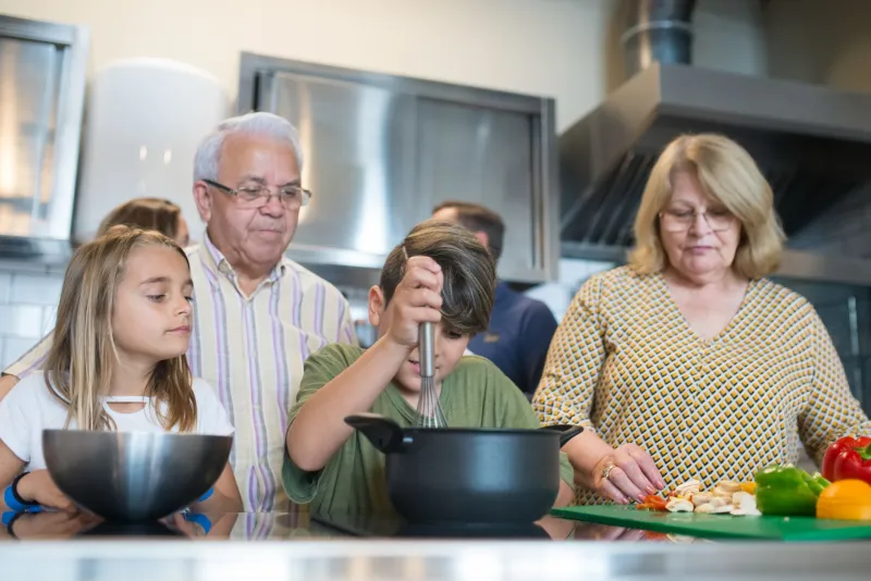 Where Grandmothers Lead: How Intergenerational Kitchens Are Becoming Unlikely Cornerstones of Food Justice